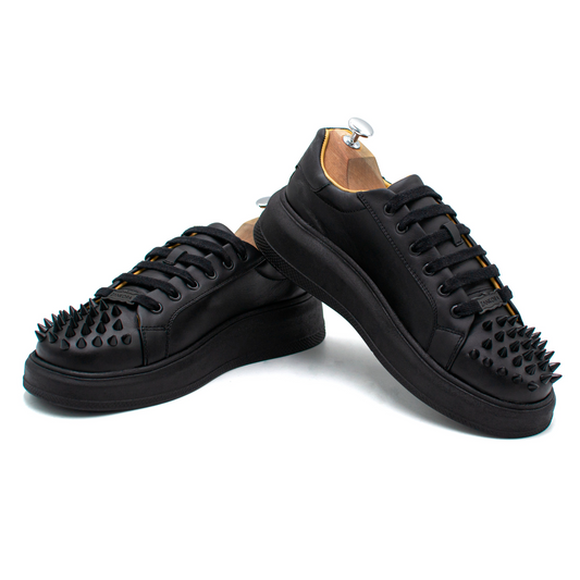 SNEAKERS EN PIEL GENUINA DE RES CON ESTOPEROLES EN PUNTERA - UIE302L